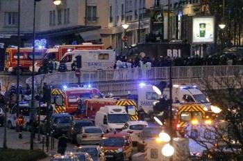 Päť hodín trvala rukojemnícka dráma v kóšer obchode vo východnej časti Paríža. Foto - TASR/AP