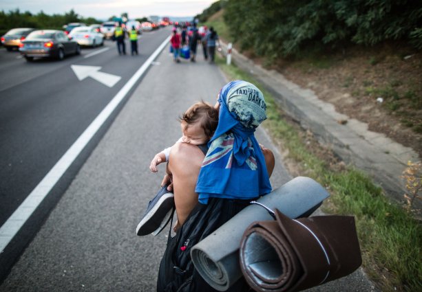 Utečenci vlani v lete v Maďarsku. Foto N- Tomáš Benedikovič