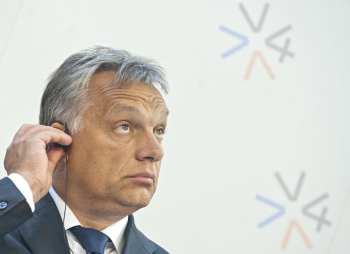 Maďarský premiér Viktor Orbán zdieľa veľmi podobný názor na utečencov ako jeho slovenský kolega Robert Fico. FOTO - TASR/AP