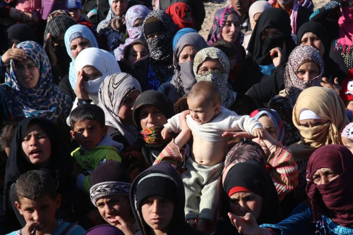 Sýrski utečenci na hraniciach s Jordánskom. Foto - TASR/AP