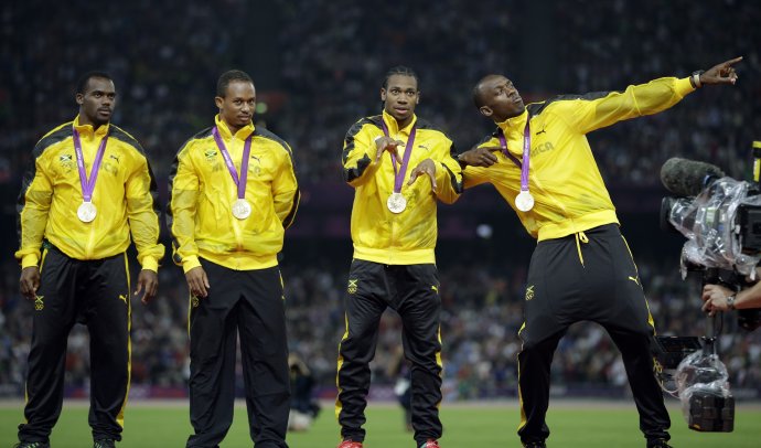 Jamajské hviezdy Nesta Carter, Michael Frater, Yohan Blake a Usain Bolt. Foto: TASR/AP
