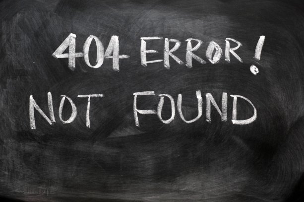 Webpage 404 error of not found written on blackboard