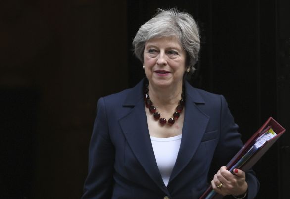 Theresa Mayová to má ťažké doma aj v zahraničí. Foto – TASR/AP