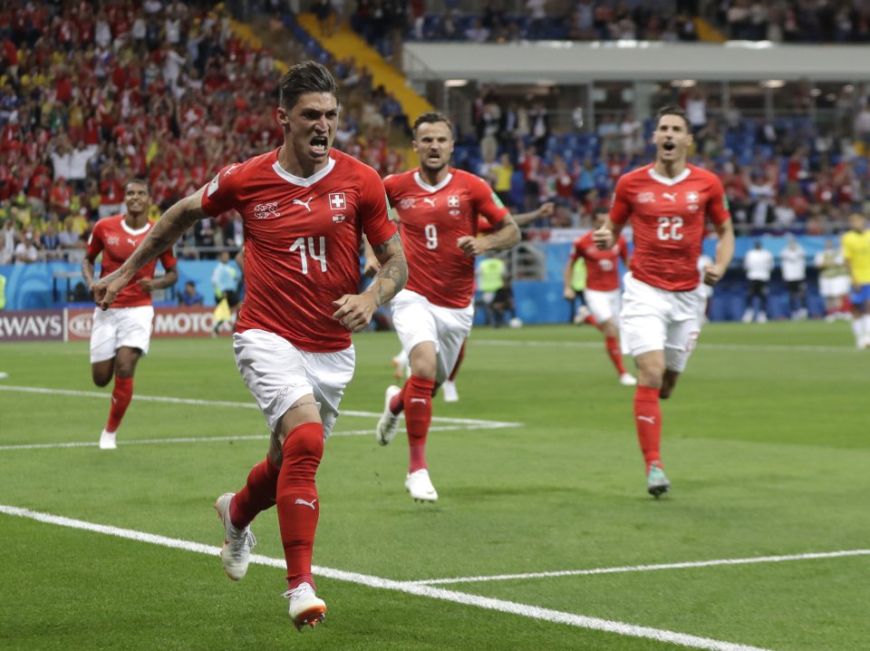 Švajčiari oslavujú gól na 1:1. Foto - AP