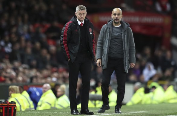 Solskjaer (vľavo) a Guardiola počas stredajšieho manchesterského derby. Foto - tasr/ap