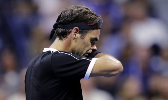 Roger Federer v zápase s Grigorom Dimitrovom. Foto – AP/Charles Krupa