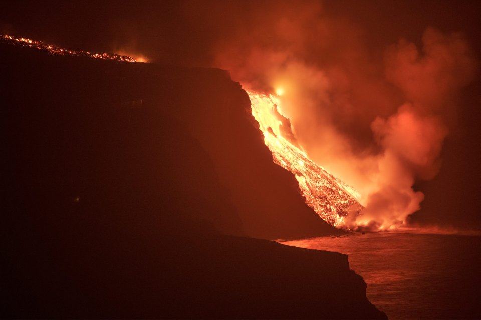 The lava of the volcano reaches the sea.  Photo - TASR / AP