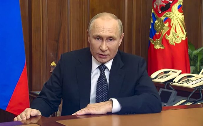 Ruský prezident Vladimir Putin v prednahratom prejave. Foto - TASR/AP