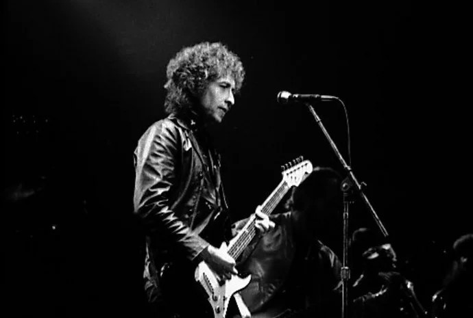 Bob Dylan na koncerte v roku 1980. Foto - Jean-Luc/Wikimedia