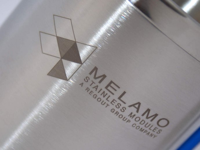 Logo firmy Melamo Stainless Modules. Foto - Melamo Stainless Modules