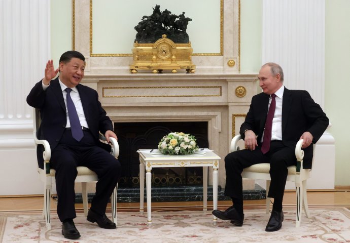 Si Ťin-pching na návšteve u Putina. Foto - TASR/AP