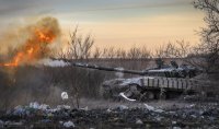 Ukrajinský tank počas bojov pri Časiv Jare. Foto - TASR/AP